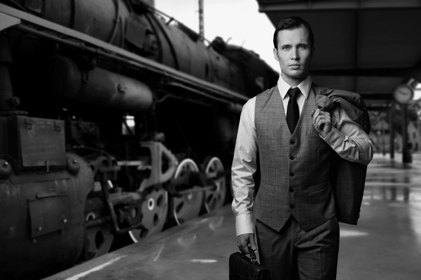 Man with a briefcase on a train station